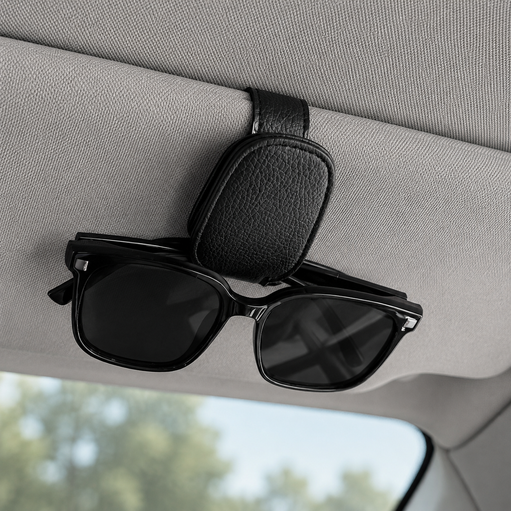 Black car sun visor glasses holder with sunglasses