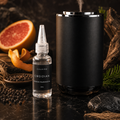 CALVIRO Obsidian 30ml fragrance refill with black pepper grapefruit and woods beside CALVIRO diffuser